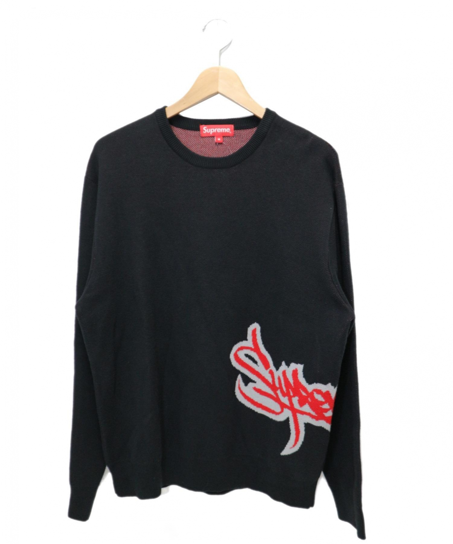 supreme sweater tag