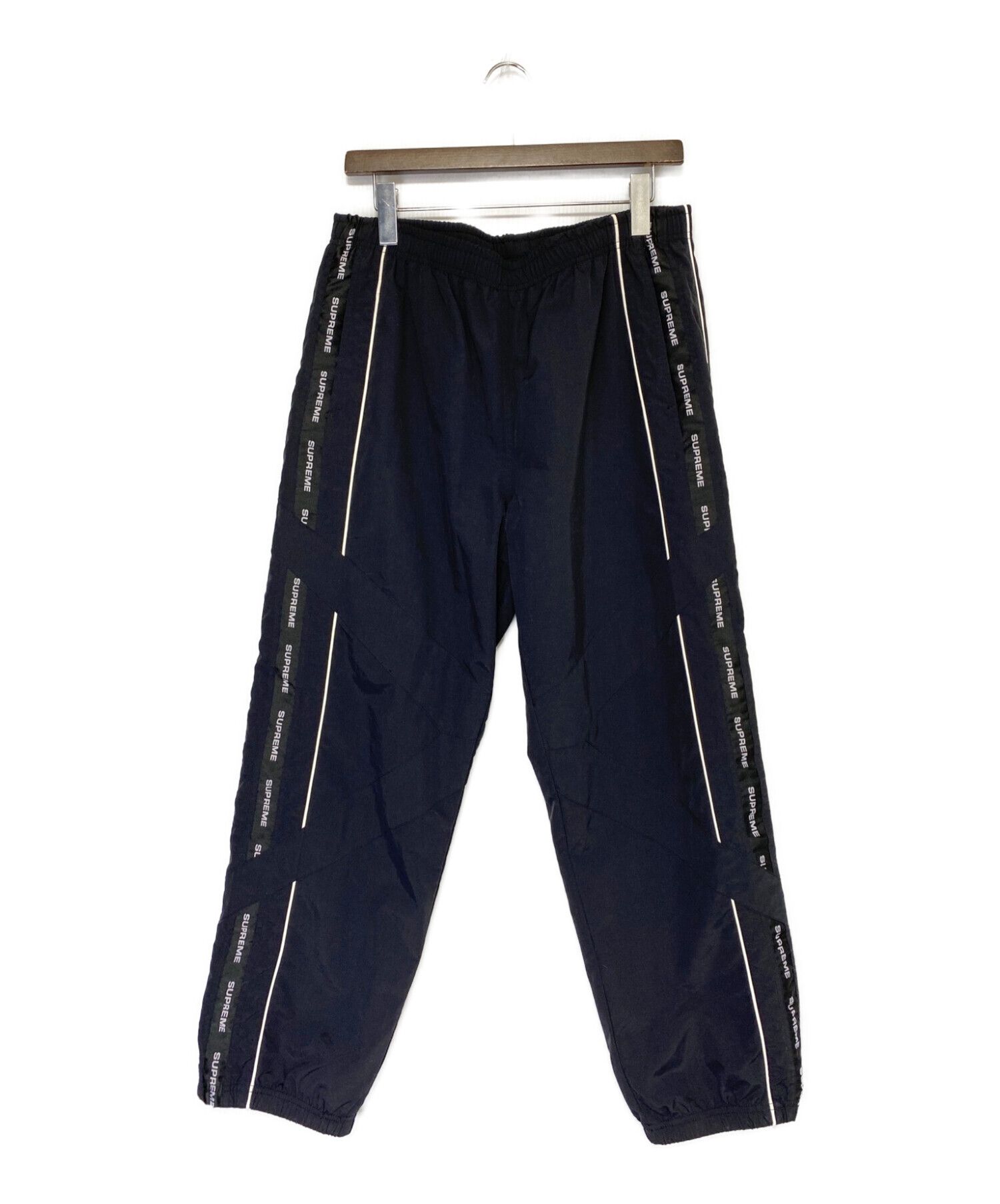 supreme cross paneled track pant